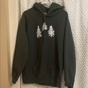 Women’s “The Woods” Green Hoodie with Tree Design and bird on the back